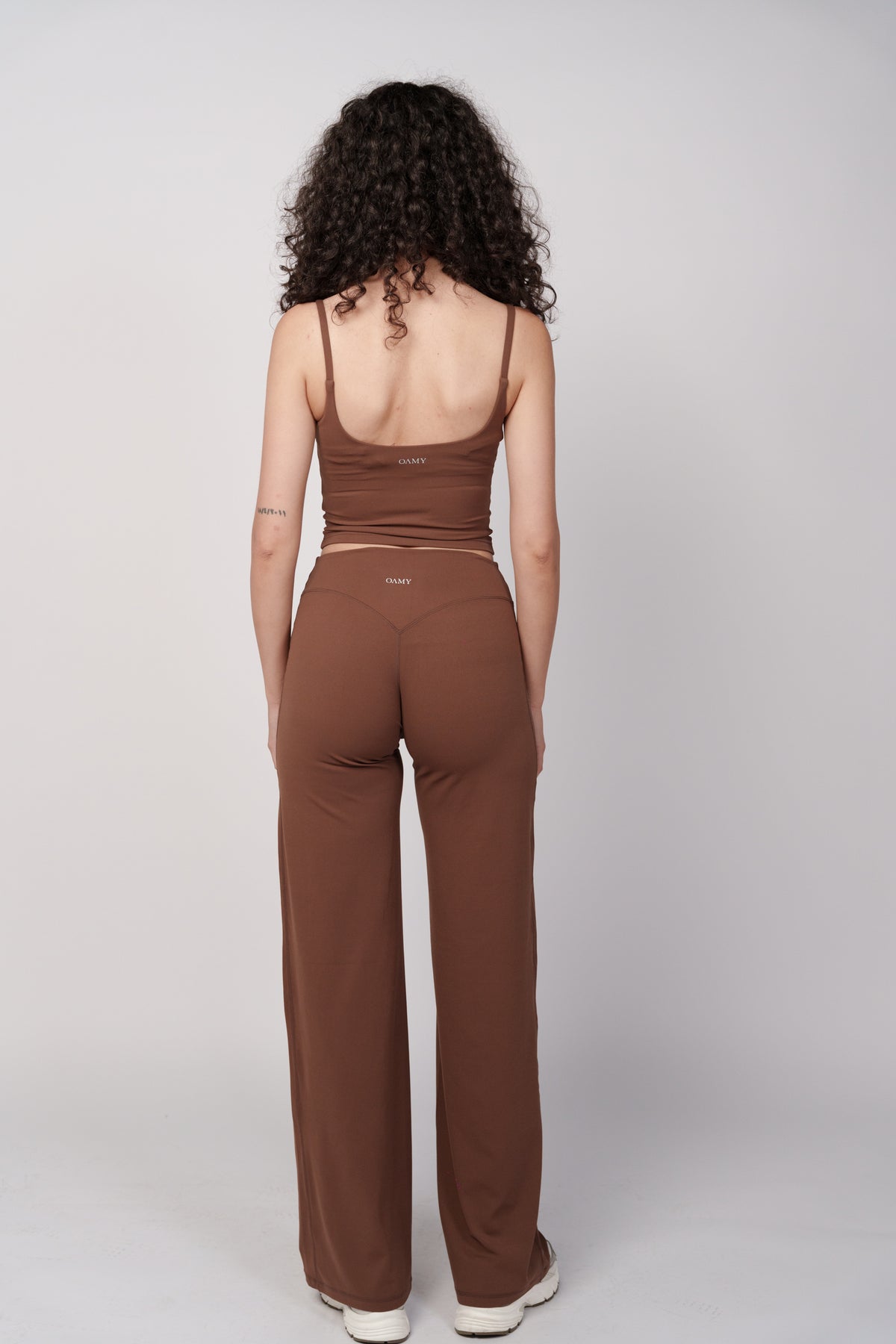 OAMY Scoop Back Top in Brown, worn with matching flared pants