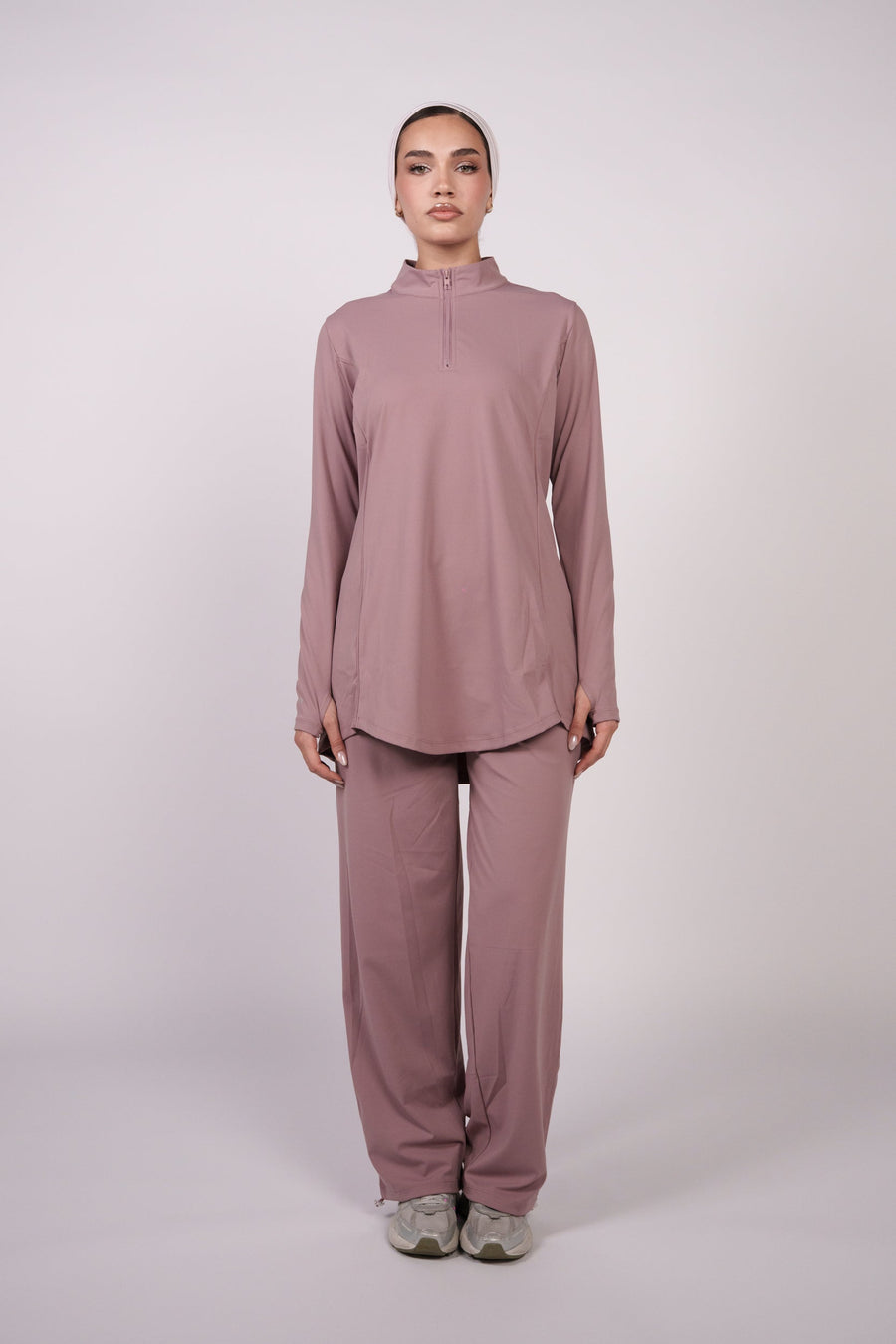 OAMY Modest Active Set in dusty rose, long-sleeve top and full-length legging shown on model as a cold-weather training base layer