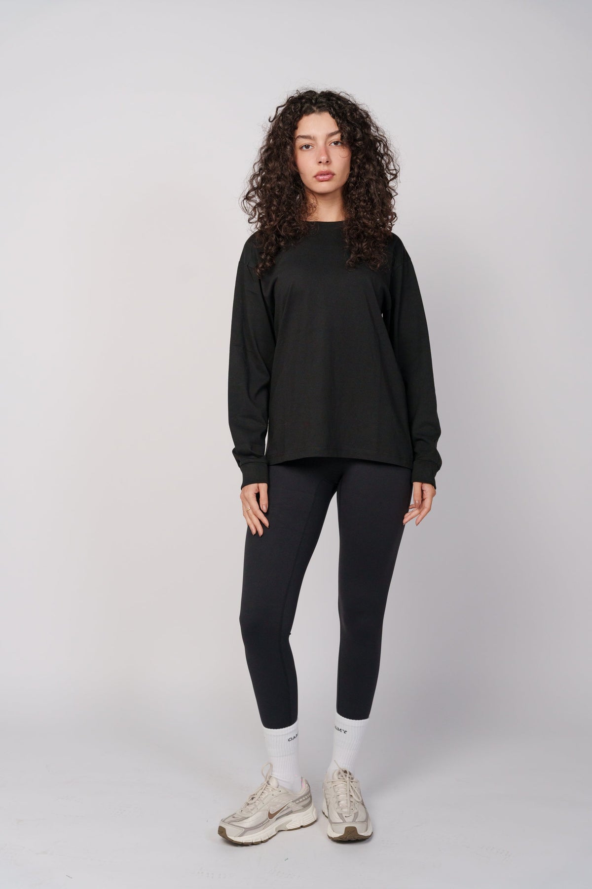 OAMY Relaxed Fit Long Sleeve T-Shirt in black, the base layer for modest back-to-campus outfits