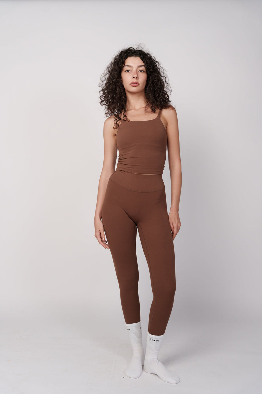 OAMY Seamless UltraSculpt Legging in brown, shown full-length on model to demonstrate opaque squat proof fabric