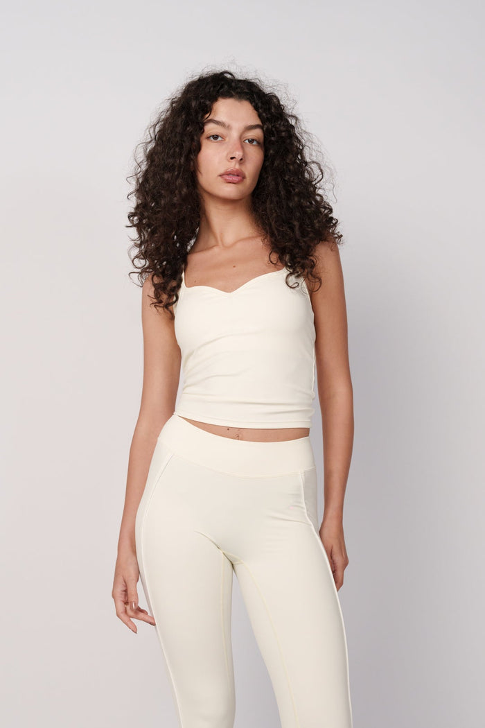 OAMY Sweetheart Strap Top in Butter Yellow, worn with matching leggings