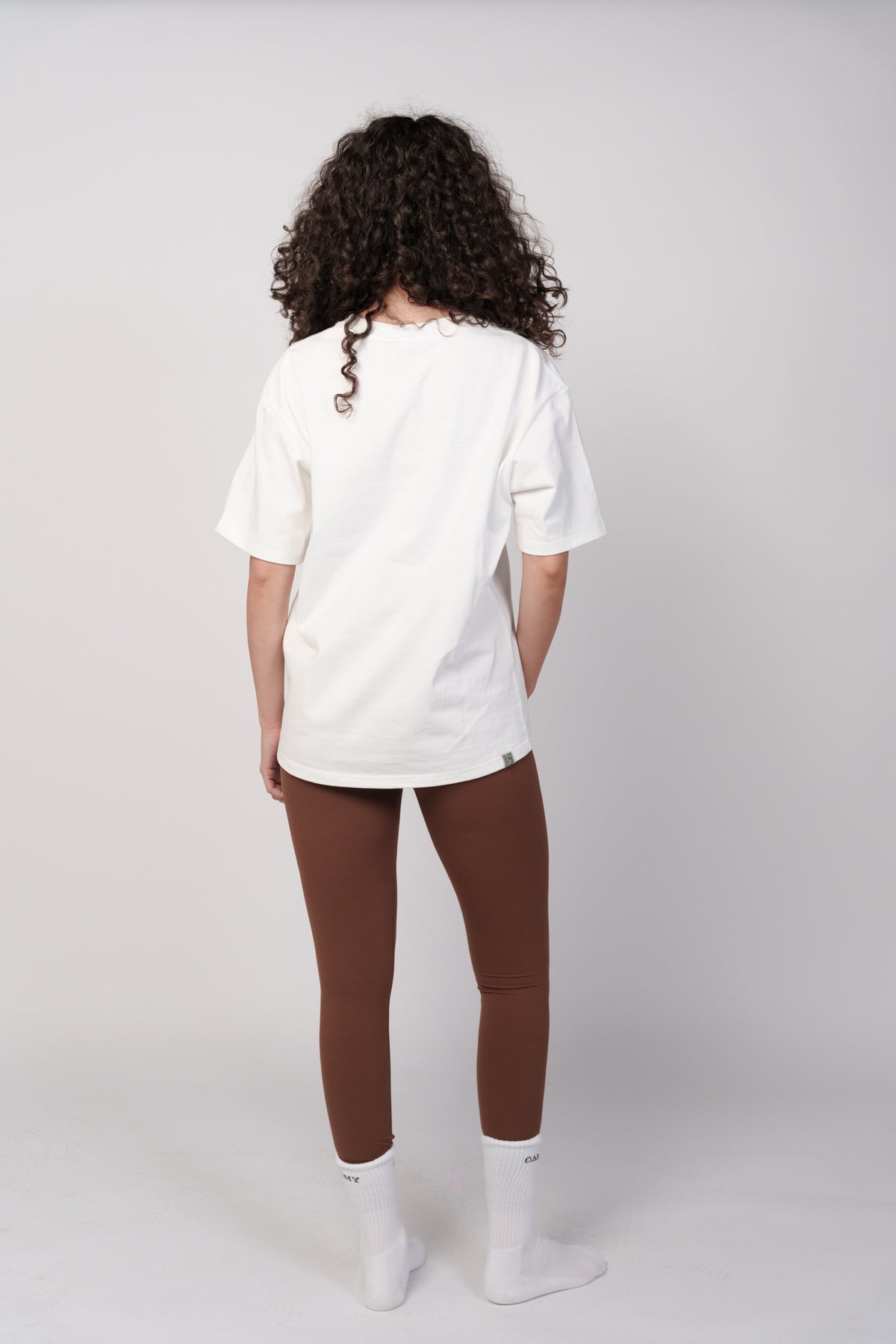 OAMY Seamless UltraSculpt Legging in Brown, styled with an oversized white shirt