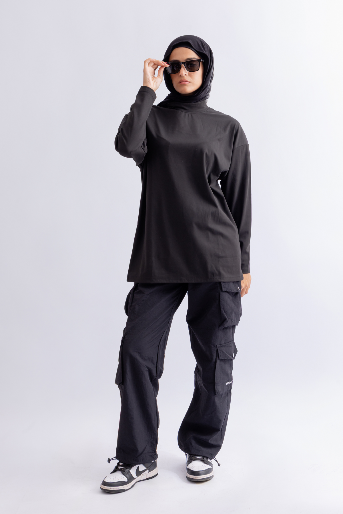 OAMY Oversized Long Soft Skin Sleeve Top in Black, styled with the Adjustable Straight Pant in Black