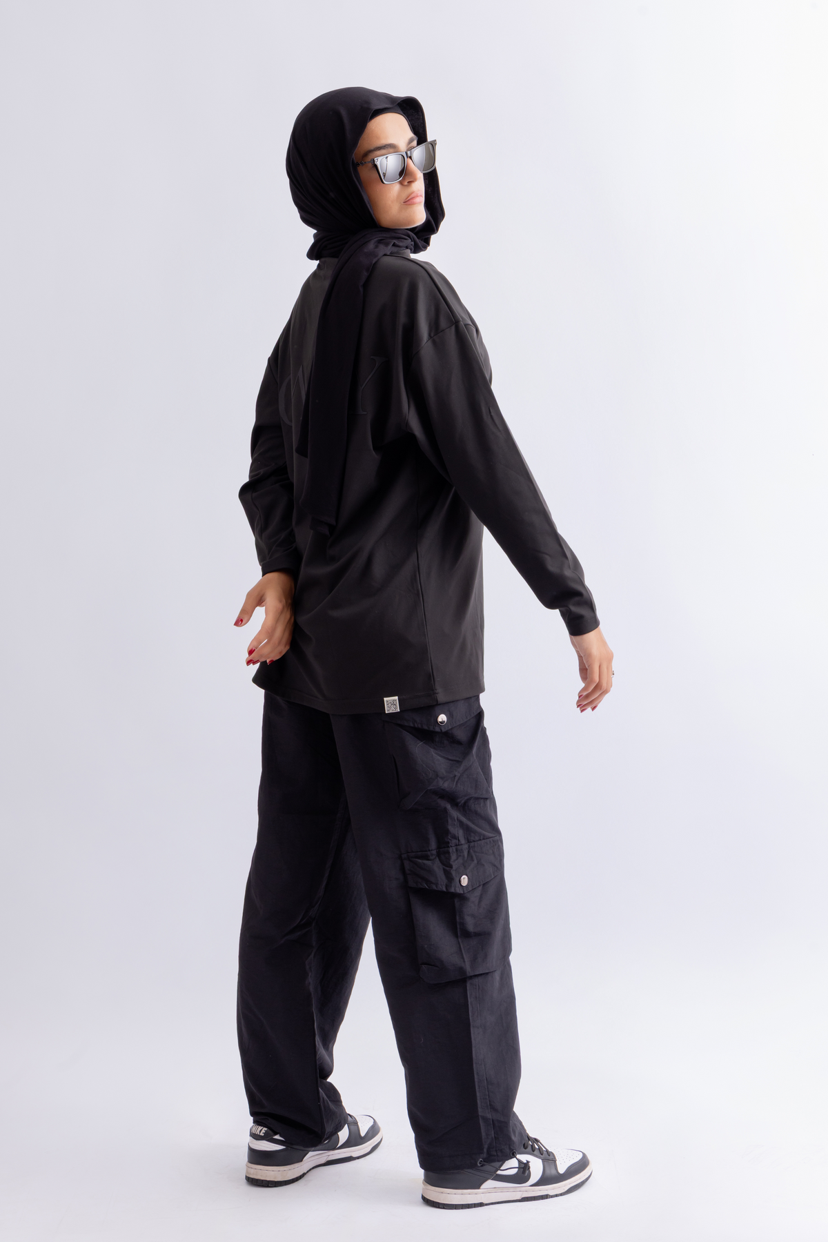 OAMY Oversized Long Soft Skin Sleeve Top in Black, styled with the Adjustable Straight Pant in Black