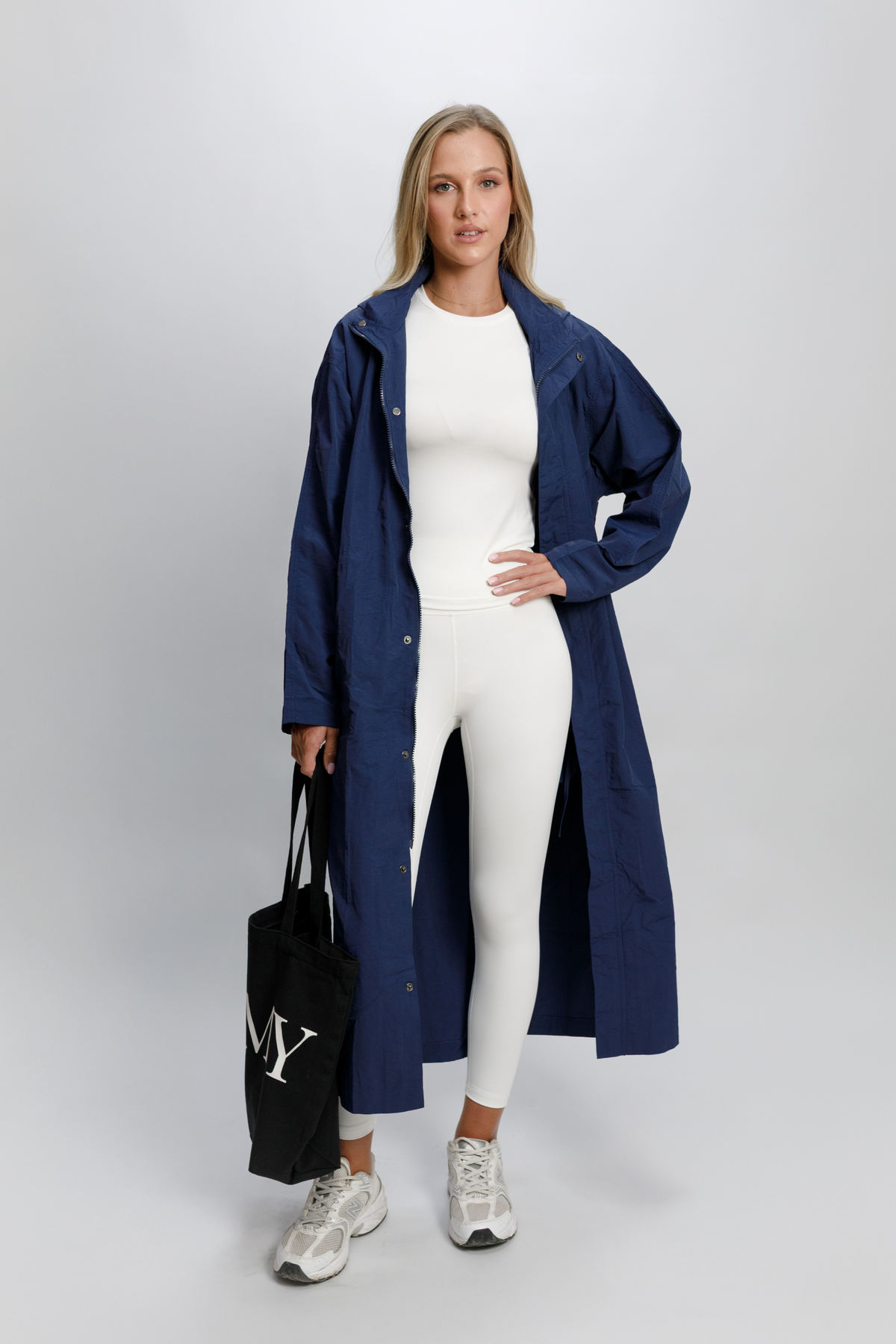 OAMY Relaxed Longline Zip Jacket in Navy, styled with the Tote Bag in Black